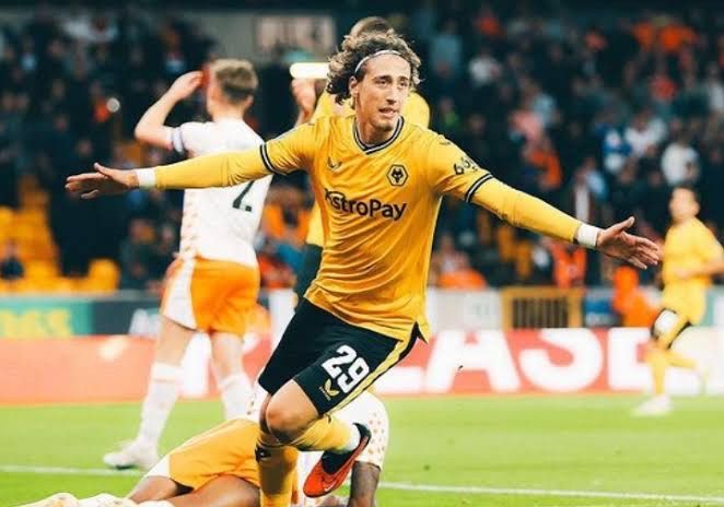Fábio Silva Dortmund transfer – Portuguese striker celebrating a goal in Wolves jersey with arms wide